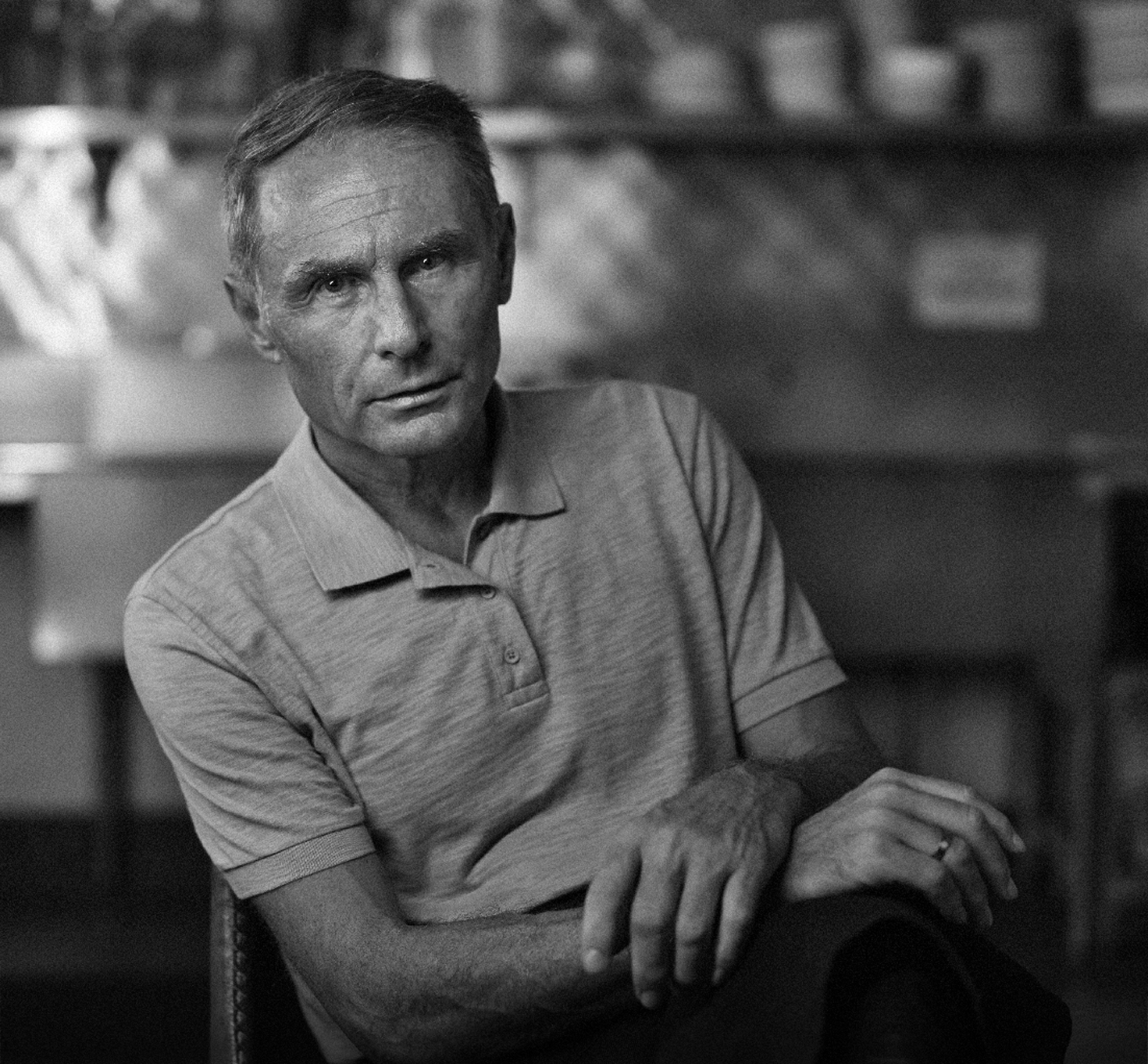 Man seated looking at camera