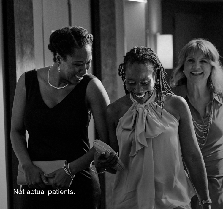Woman laughing together with friends