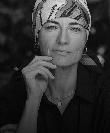 Pensive woman looking at camera