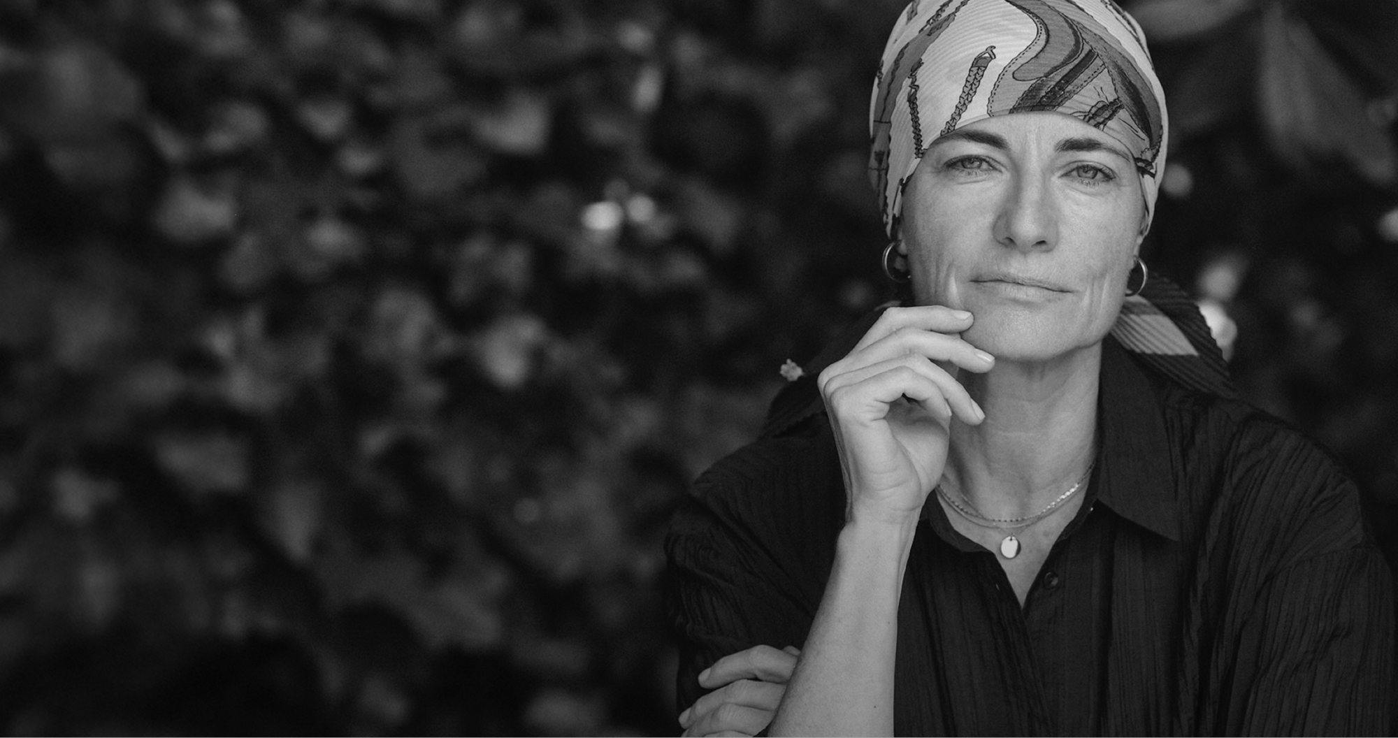 Pensive woman looking at camera